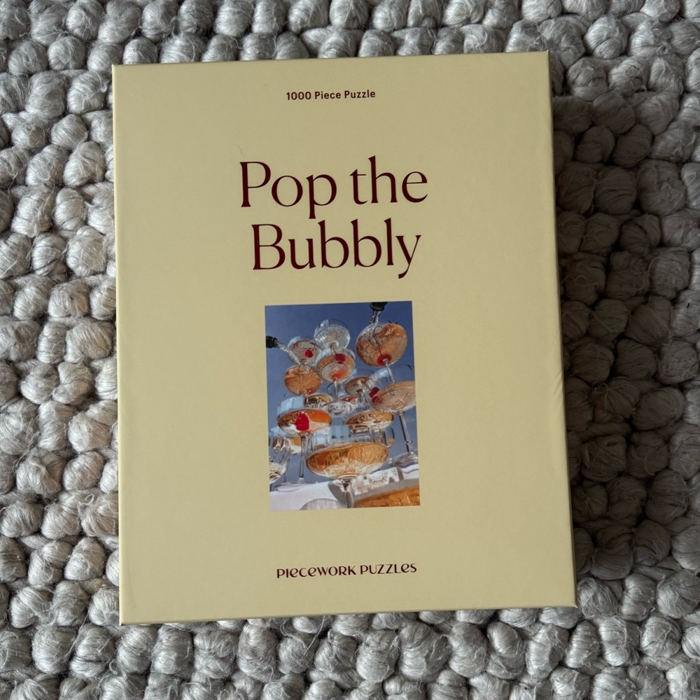 Piecework 1000 piece Puzzle 'Pop the Bubbly'